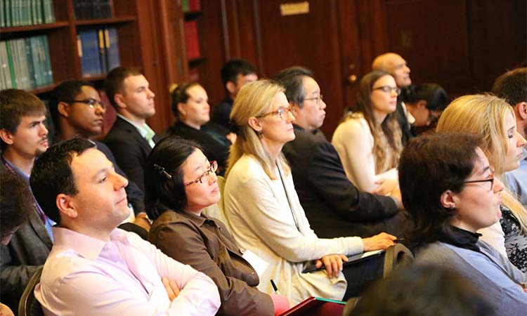 Meeting attendees listening to presentation